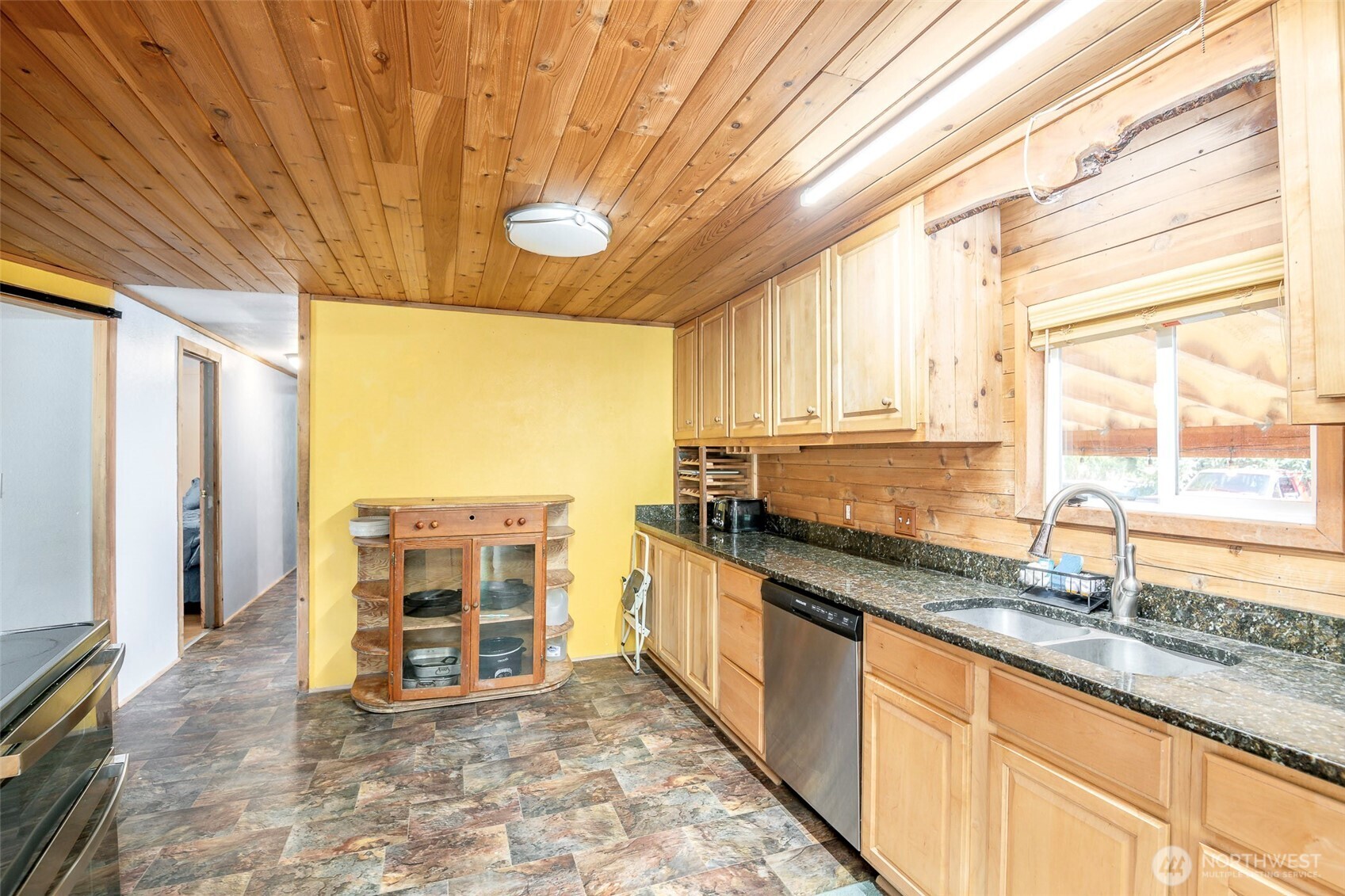 142 Gharet Road Randle, WA 98377 - Photo 7 of 32 a large kitchen with kitchen island granite countertop a large window and a sink