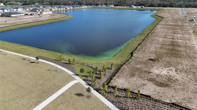 a view of swimming pool with a yard