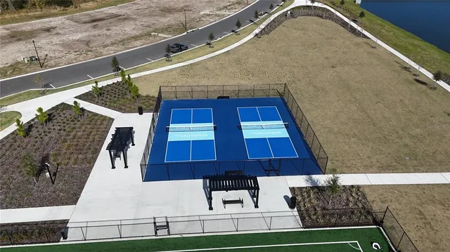 a view of swimming pool and outdoor seating