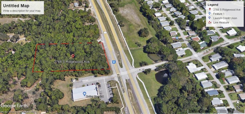 2768 South Ridgewood Avenue Edgewater, FL 32141 - Photo 1 of 2 an aerial view of a residential apartment building with a yard