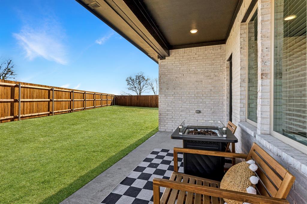 490 Tender Summit Lavon, TX 75166 - Photo 21 of 23 a view of back yard of the house
