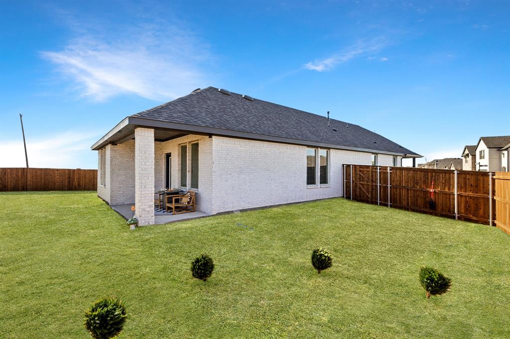 490 Tender Summit Lavon, TX 75166 - Photo 23 of 23 a view of a house with backyard