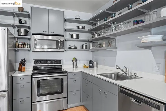 a view of a dining room with furniture chandelier and wooden floor