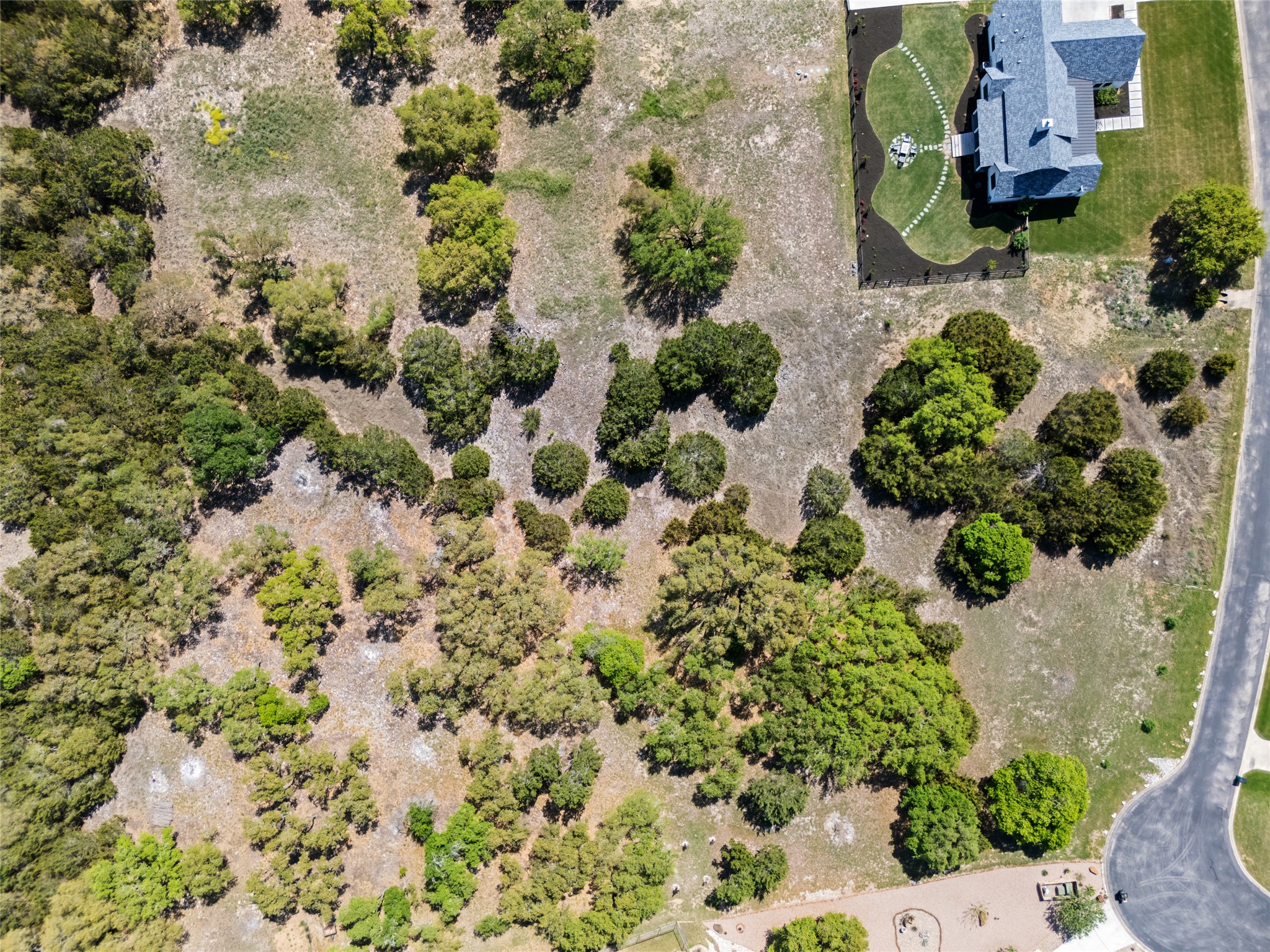 332 First Down Dash Burnet, TX 78611 - Photo 2 of 25 an aerial view of residential house with parking