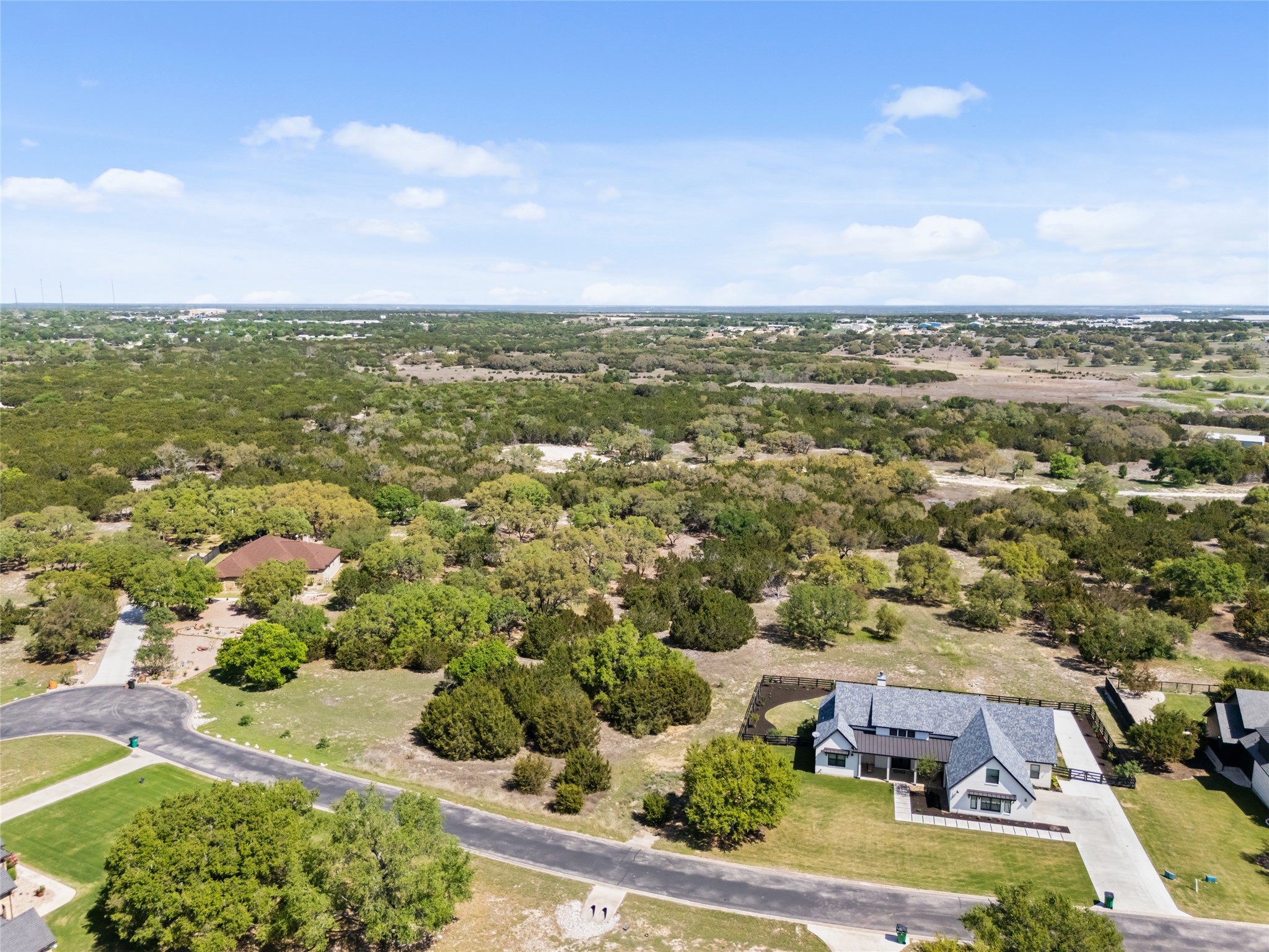 332 First Down Dash Burnet, TX 78611 - Photo 4 of 25 an aerial view of residential houses with outdoor space