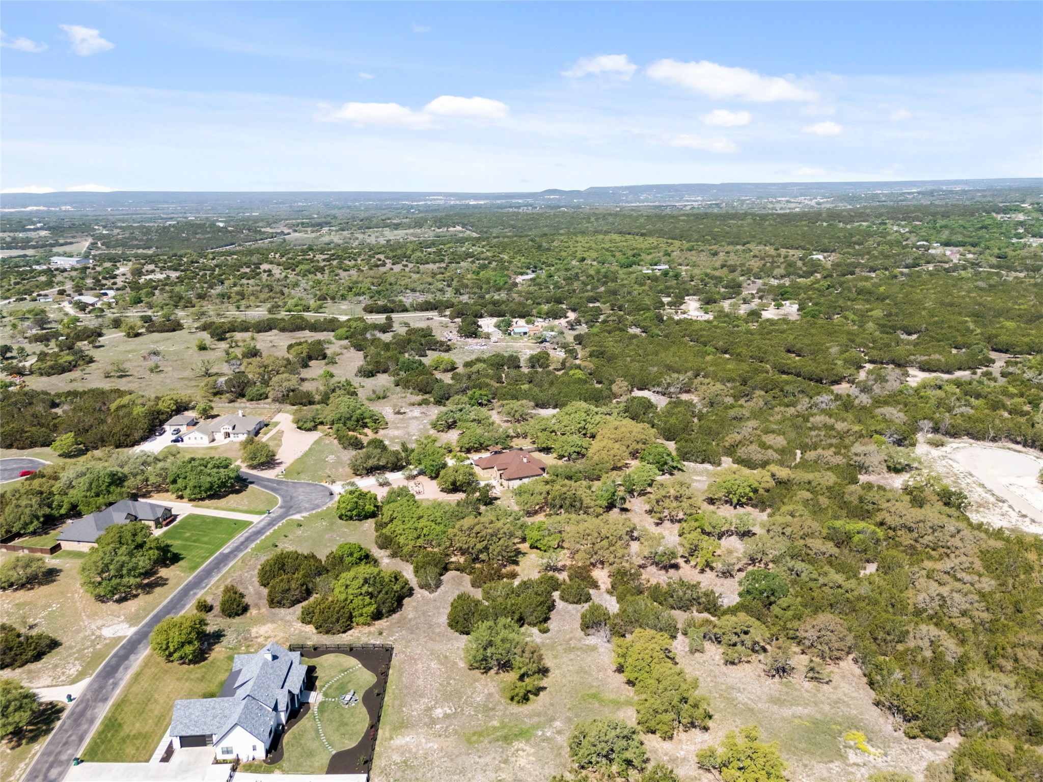 332 First Down Dash Burnet, TX 78611 - Photo 5 of 25 an aerial view of residential houses with outdoor space