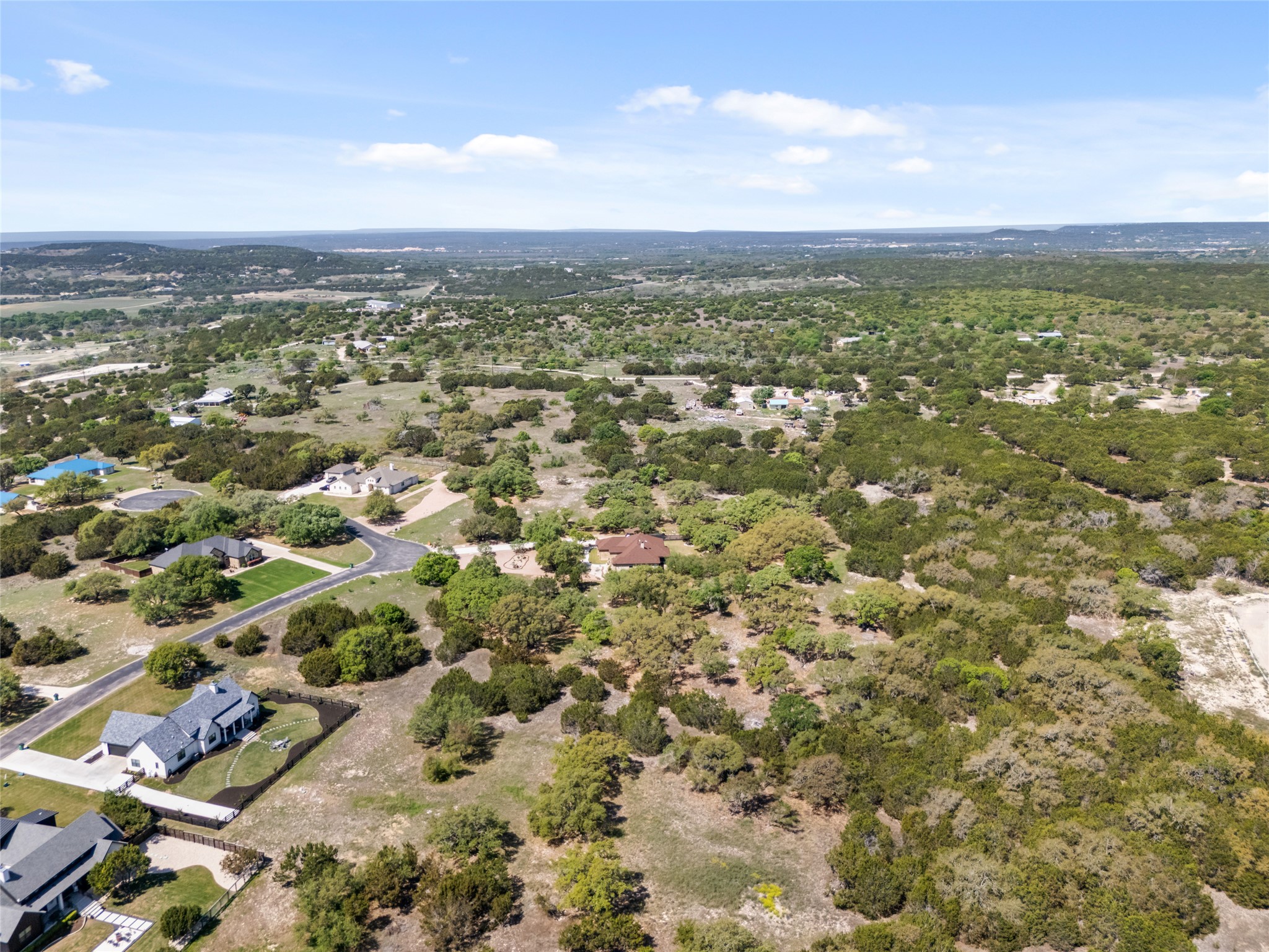 332 First Down Dash Burnet, TX 78611 - Photo 6 of 25 an aerial view of residential houses with outdoor space