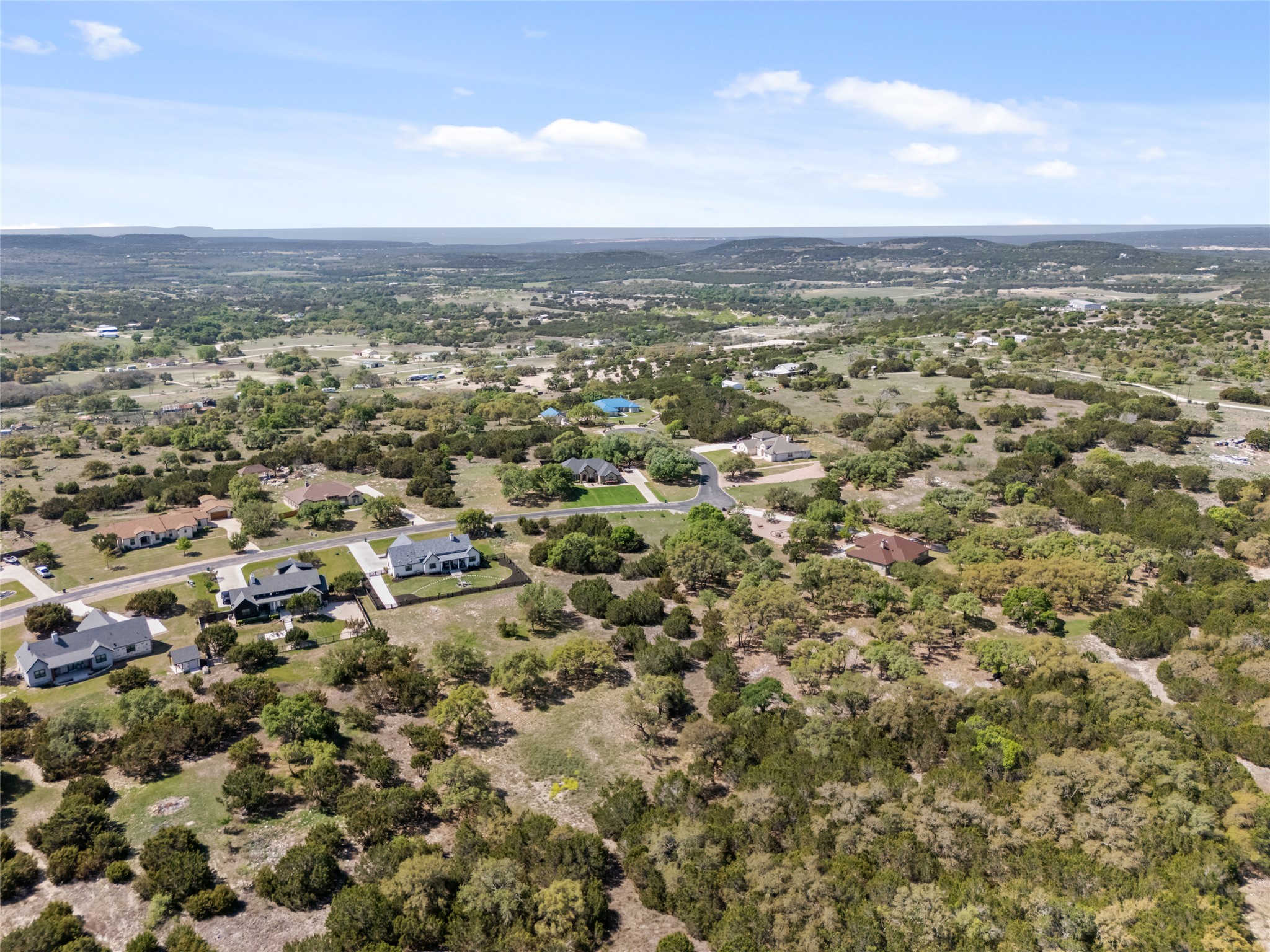 332 First Down Dash Burnet, TX 78611 - Photo 7 of 25 an aerial view of residential building with green space