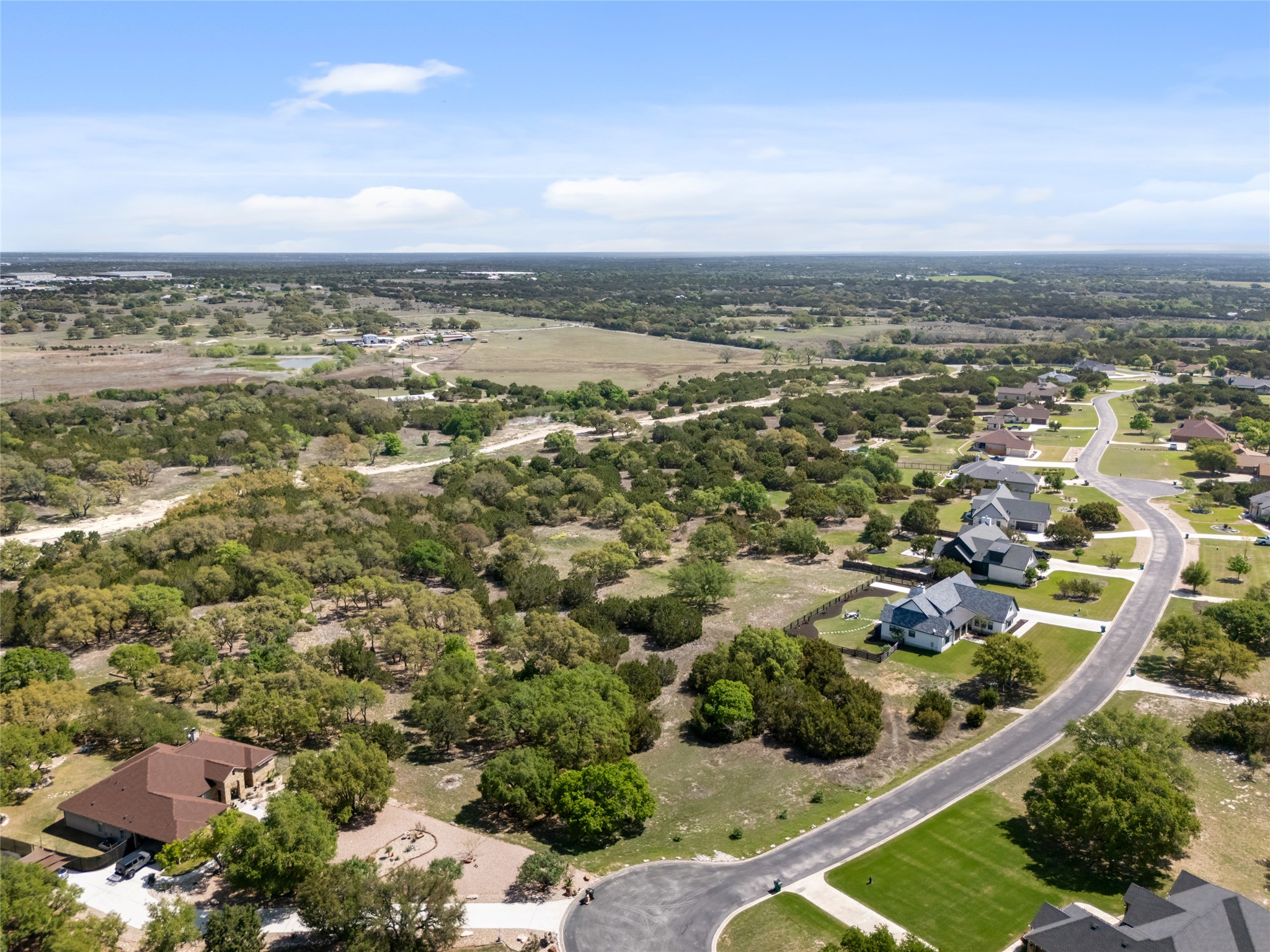 332 First Down Dash Burnet, TX 78611 - Photo 10 of 25 an aerial view of residential building with green space