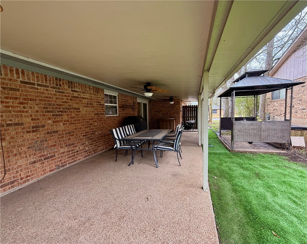 2108 Pantera Drive Bryan, TX 77807 - Photo 18 of 20 a view of a porch with chairs and a yard