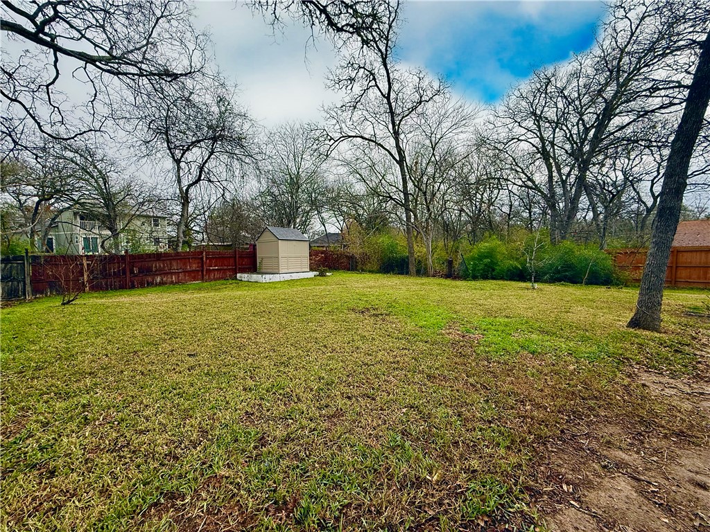 2108 Pantera Drive Bryan, TX 77807 - Photo 19 of 20 a view of a yard with a house in the background