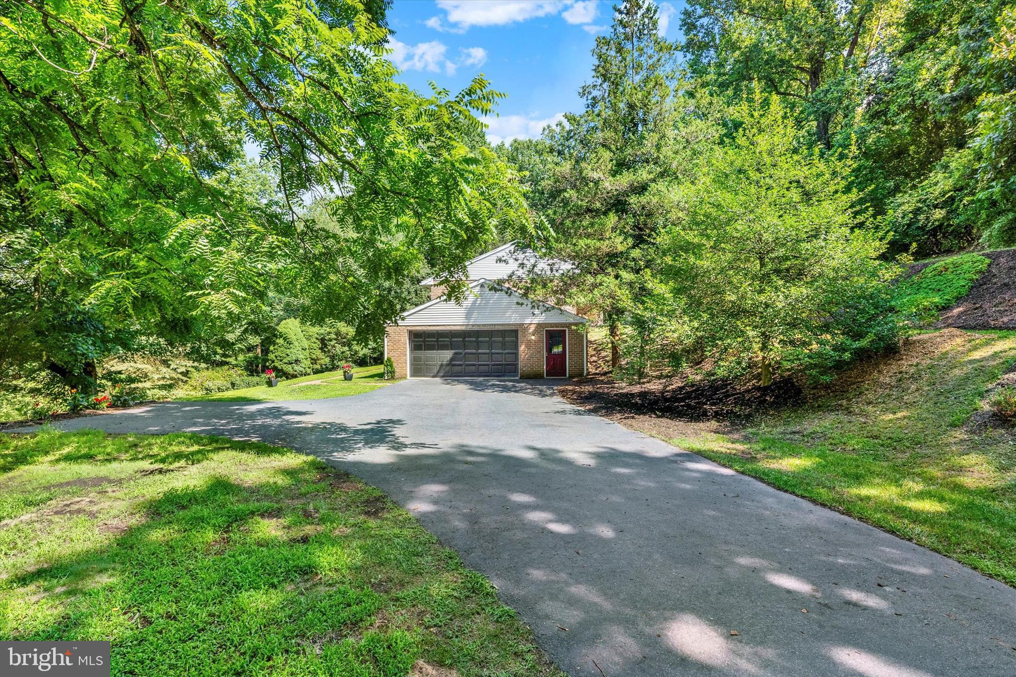 49 Fawn Drive Reading, PA 19607 - Photo 3 of 44 Side entry garage - summer