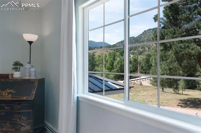 a view of a room and window