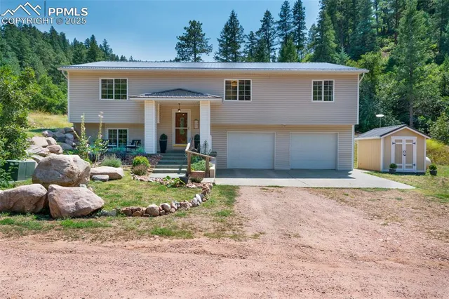 a front view of house with yard and seating space