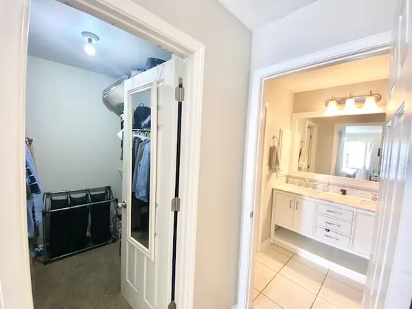 a view of a kitchen from the hallway