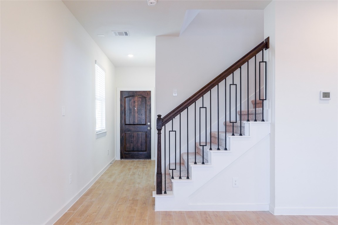 6618 Escondido Drive Rosharon, TX 77583 - Photo 5 of 31 a view of a hallway with staircase