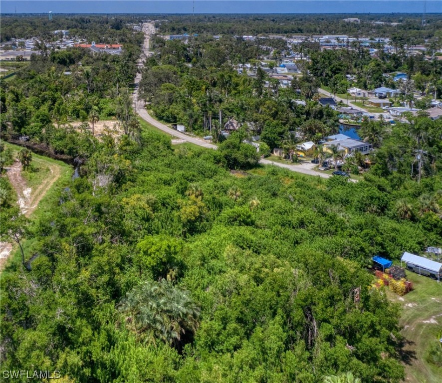 River Road North Fort Myers, FL 33903 - Photo 2 of 3 an aerial view of residential house with outdoor space and trees all around