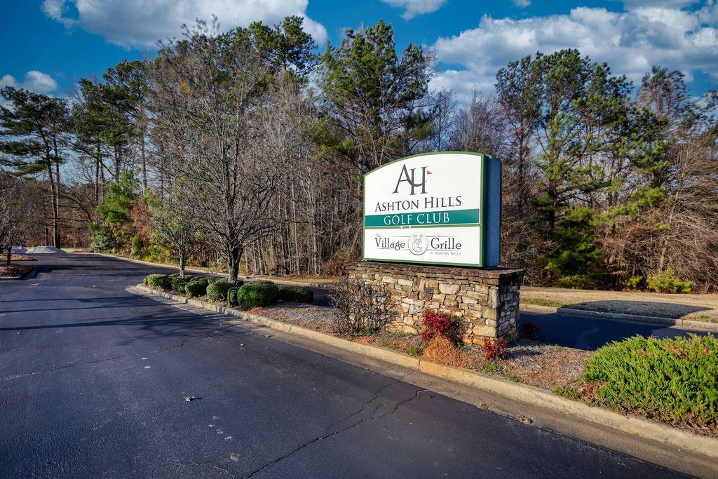 9142 Golfview Circle Covington, GA 30014 - Photo 10 of 11 a sign that is on the side of a road