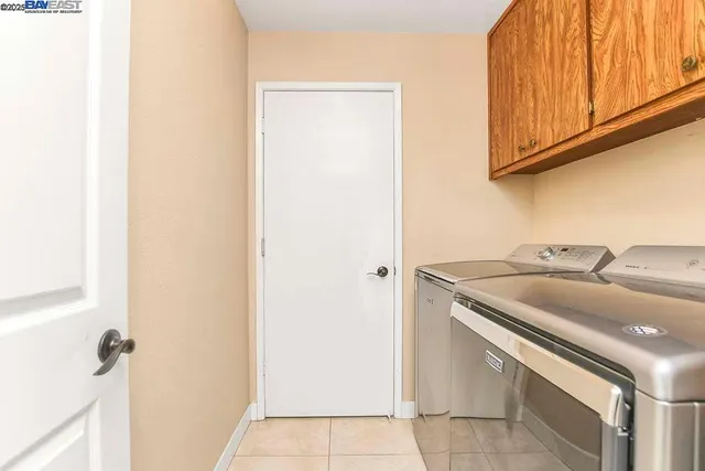 a utility room with washer and dryer