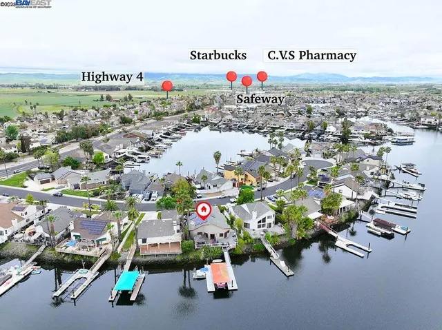 a picture of a room with lots of white furniture