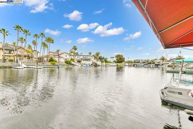 a aerial view of a house with a yard