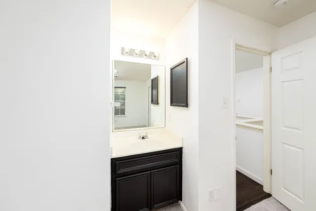 a view of a kitchen with a sink