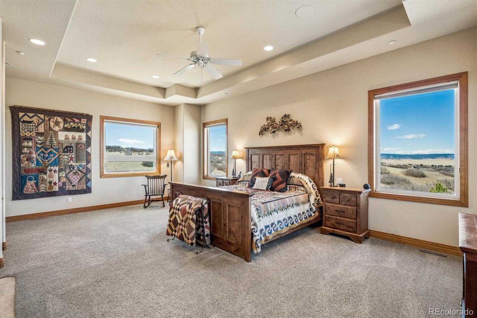 3959 Serenade Road Castle Rock, CO 80104 - Photo 25 of 50 a bed room with a bed and a window