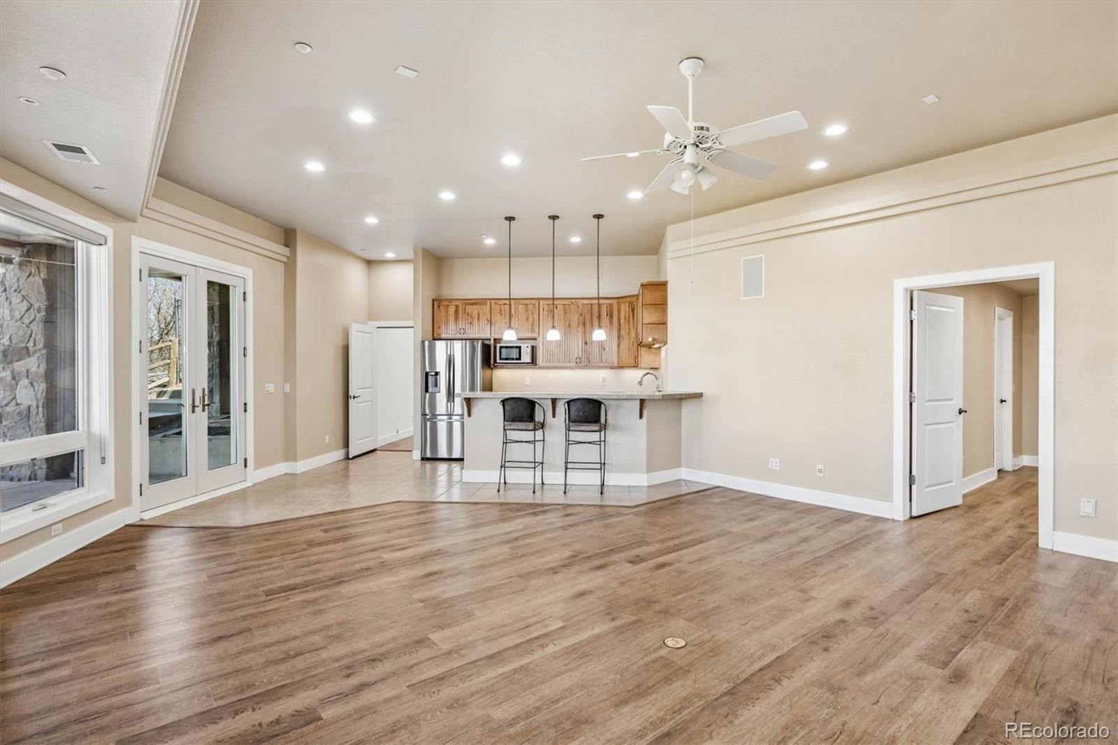 3959 Serenade Road Castle Rock, CO 80104 - Photo 39 of 50 a view of kitchen with cabinets and wooden floor