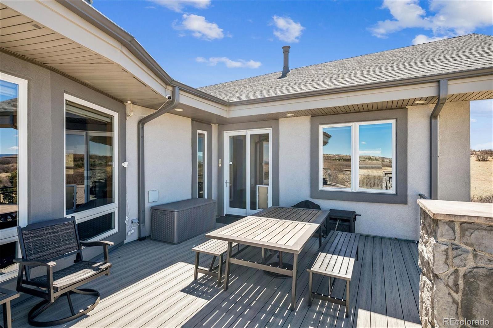 3959 Serenade Road Castle Rock, CO 80104 - Photo 45 of 50 a balcony with furniture and rug