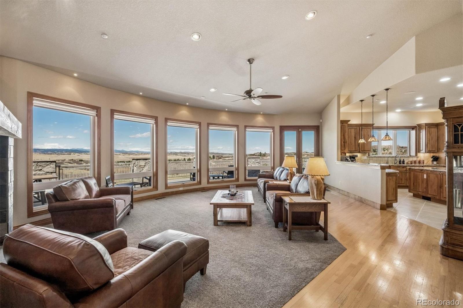 3959 Serenade Road Castle Rock, CO 80104 - Photo 9 of 50 a living room with furniture and a large window