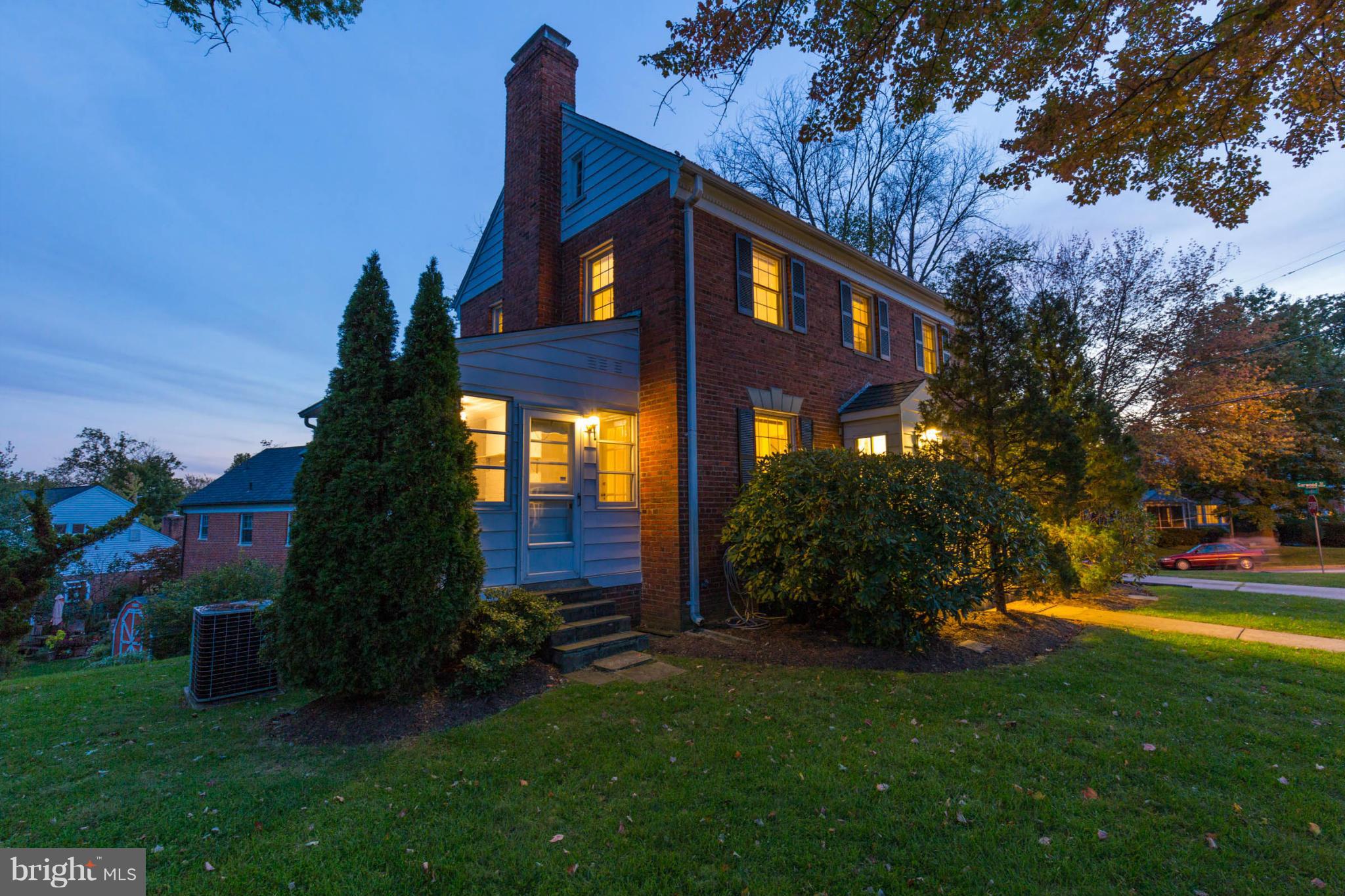 207 Indian Spring Drive Silver Spring, MD 20901 - Photo 2 of 30 a front view of house with a garden