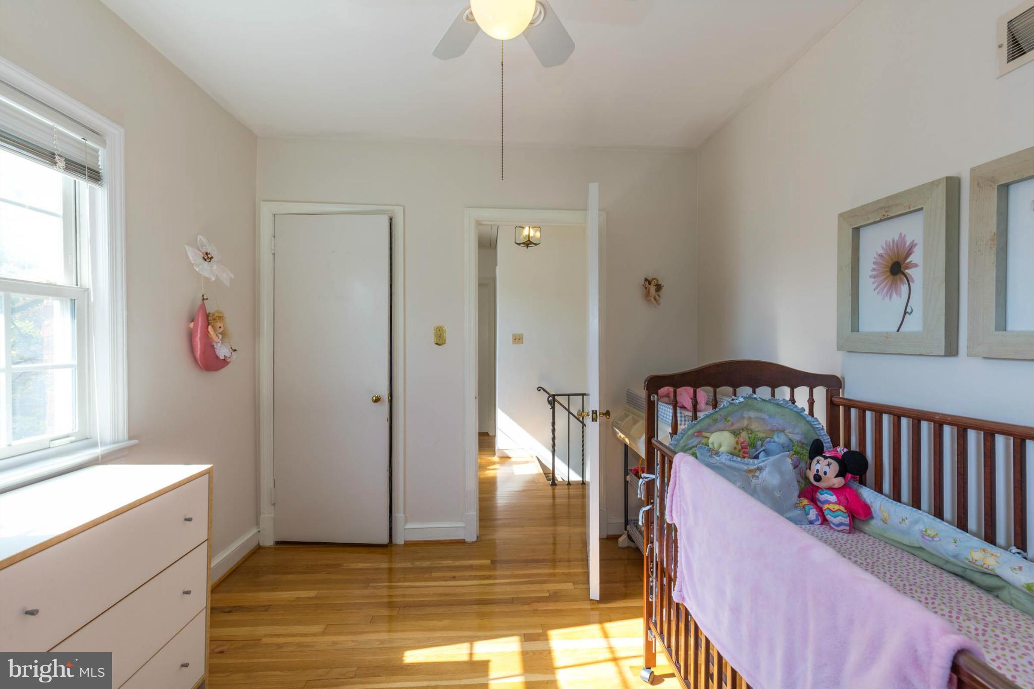 207 Indian Spring Drive Silver Spring, MD 20901 - Photo 22 of 30 a view of entryway with a window and wooden floor