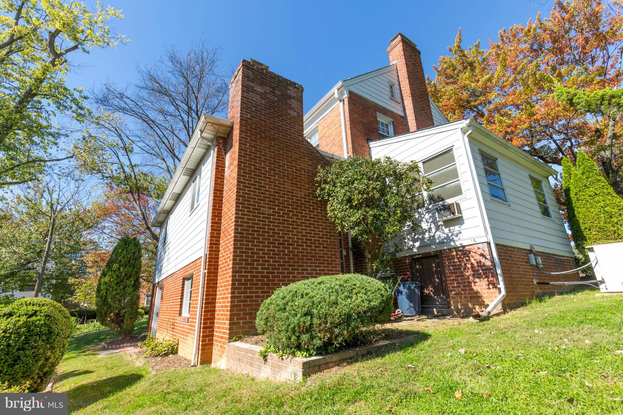 207 Indian Spring Drive Silver Spring, MD 20901 - Photo 29 of 30 front view of a house with a yard