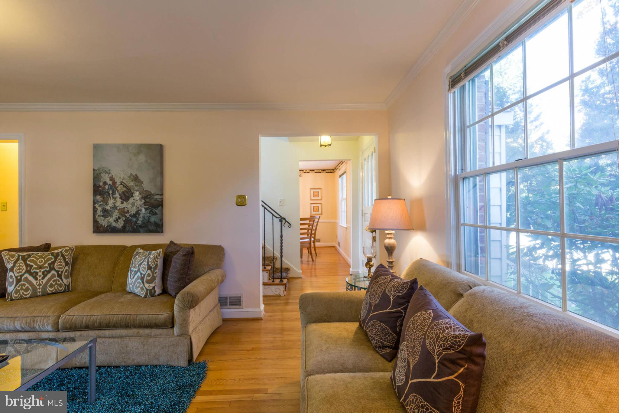 207 Indian Spring Drive Silver Spring, MD 20901 - Photo 6 of 30 a living room with furniture and a large window