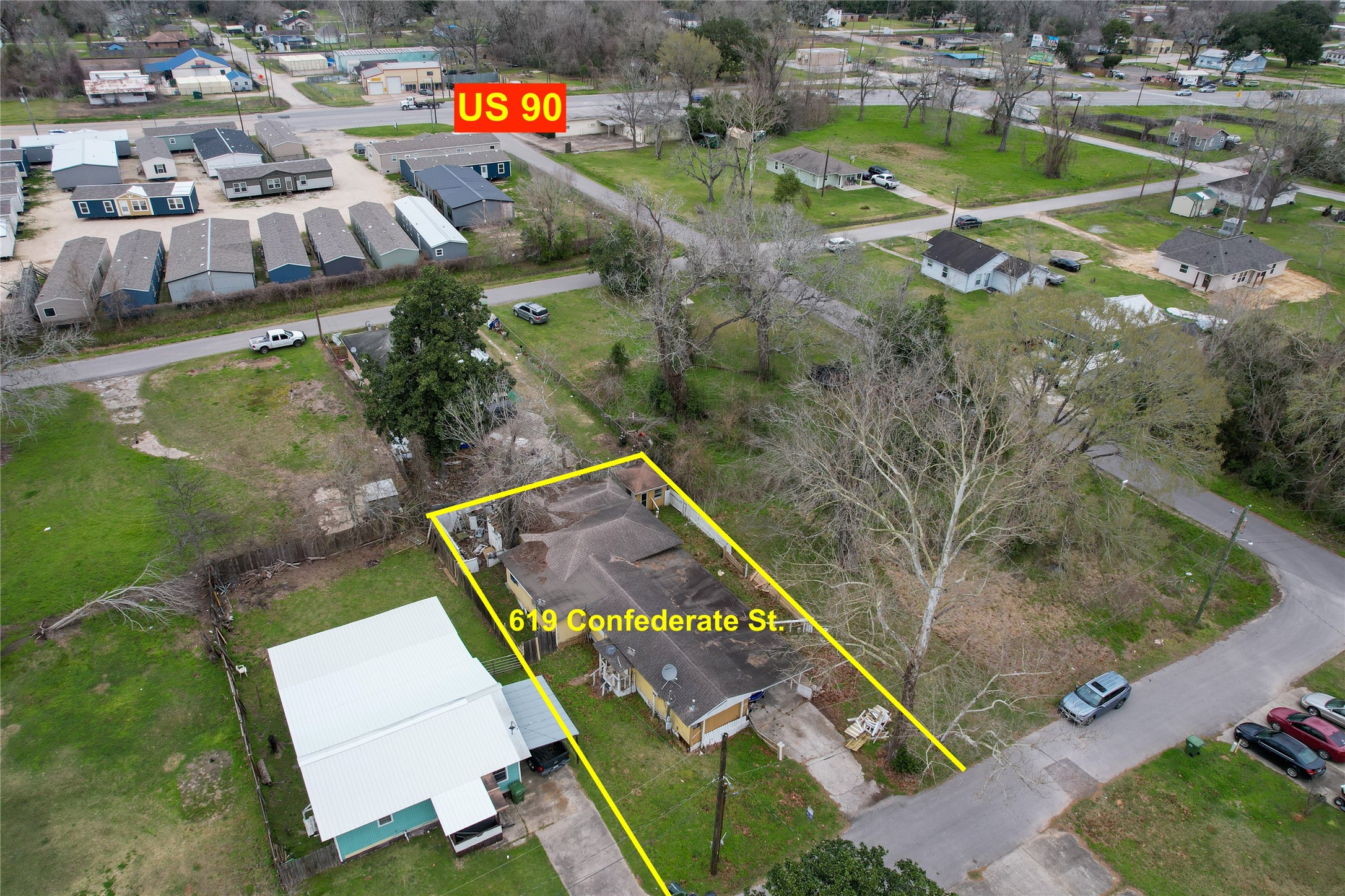 619 Confederate Street Liberty, TX 77575 - Photo 2 of 7 an aerial view of a house with a swimming pool