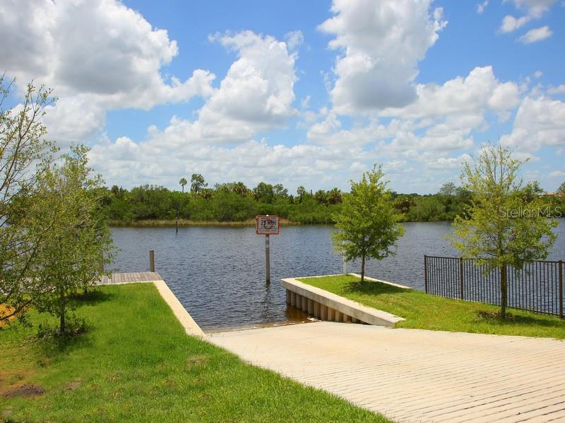 1624 Rio Vista Terrace Parrish, FL 34219 - Photo 12 of 13 a view of a lake with a yard
