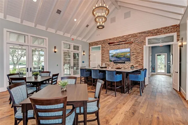a view of a dining room with furniture window and outside view