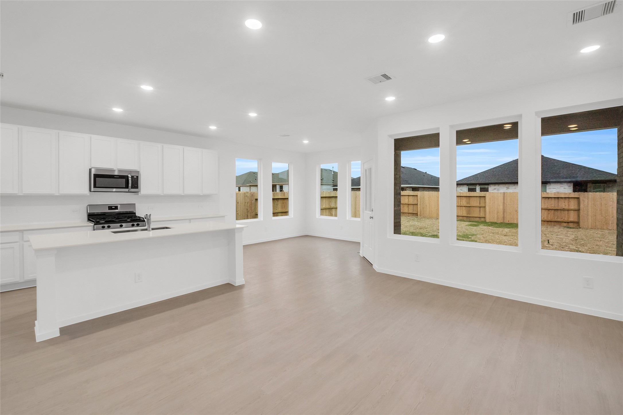 22011 Maddaloni View Drive Hockley, TX 77447 - Photo 14 of 33 a view of kitchen with stainless steel appliances refrigerator oven and cabinets