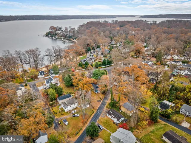 an aerial view of house with yard
