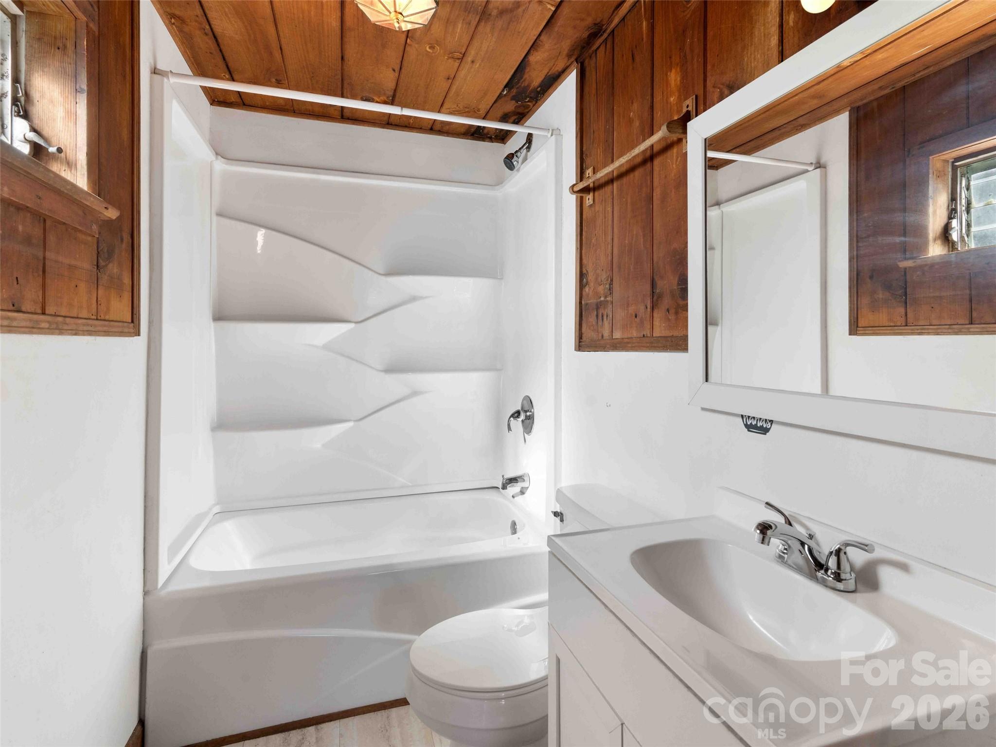 118 Rutledge Drive Hendersonville, NC 28739 - Photo 37 of 48 a bathroom with a sink and a bathtub