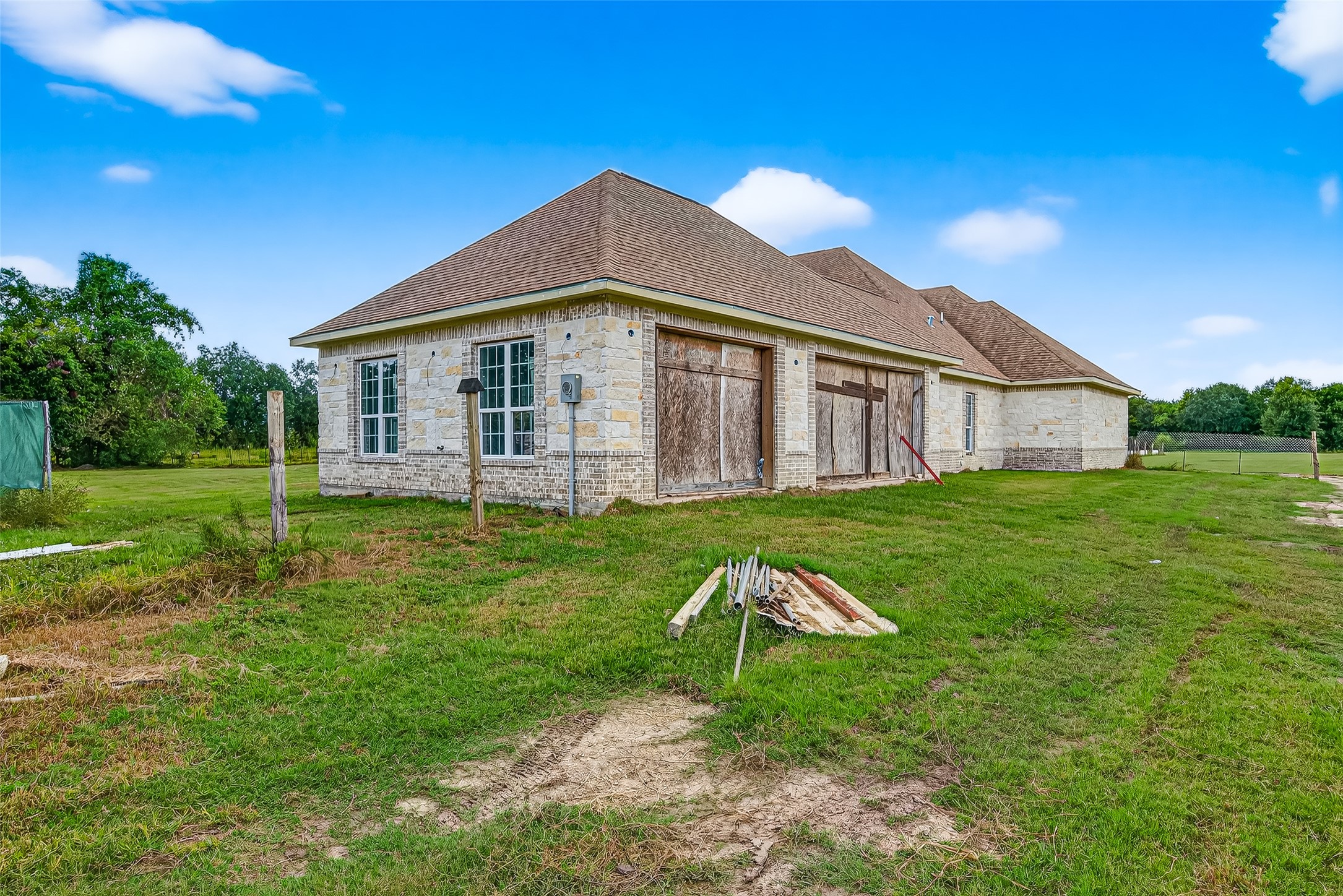1013 Battlebell Road Highlands, TX 77562 - Photo 25 of 47 a front view of a house with yard and green space