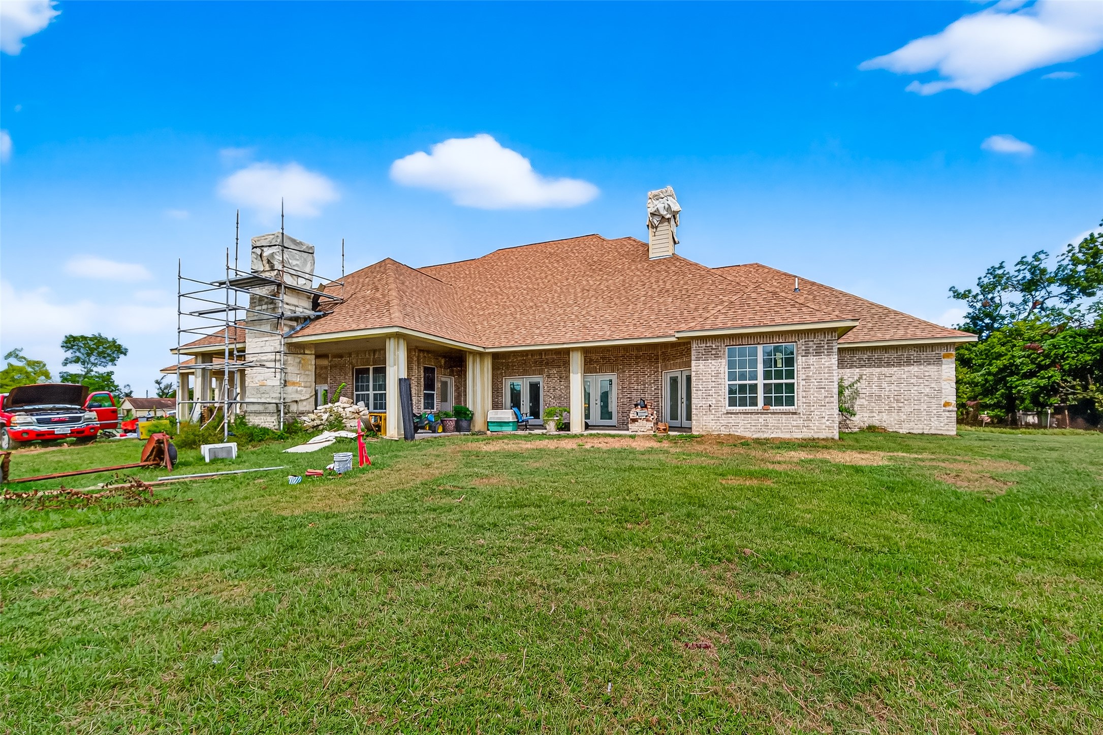1013 Battlebell Road Highlands, TX 77562 - Photo 30 of 47 a front view of a house with garden