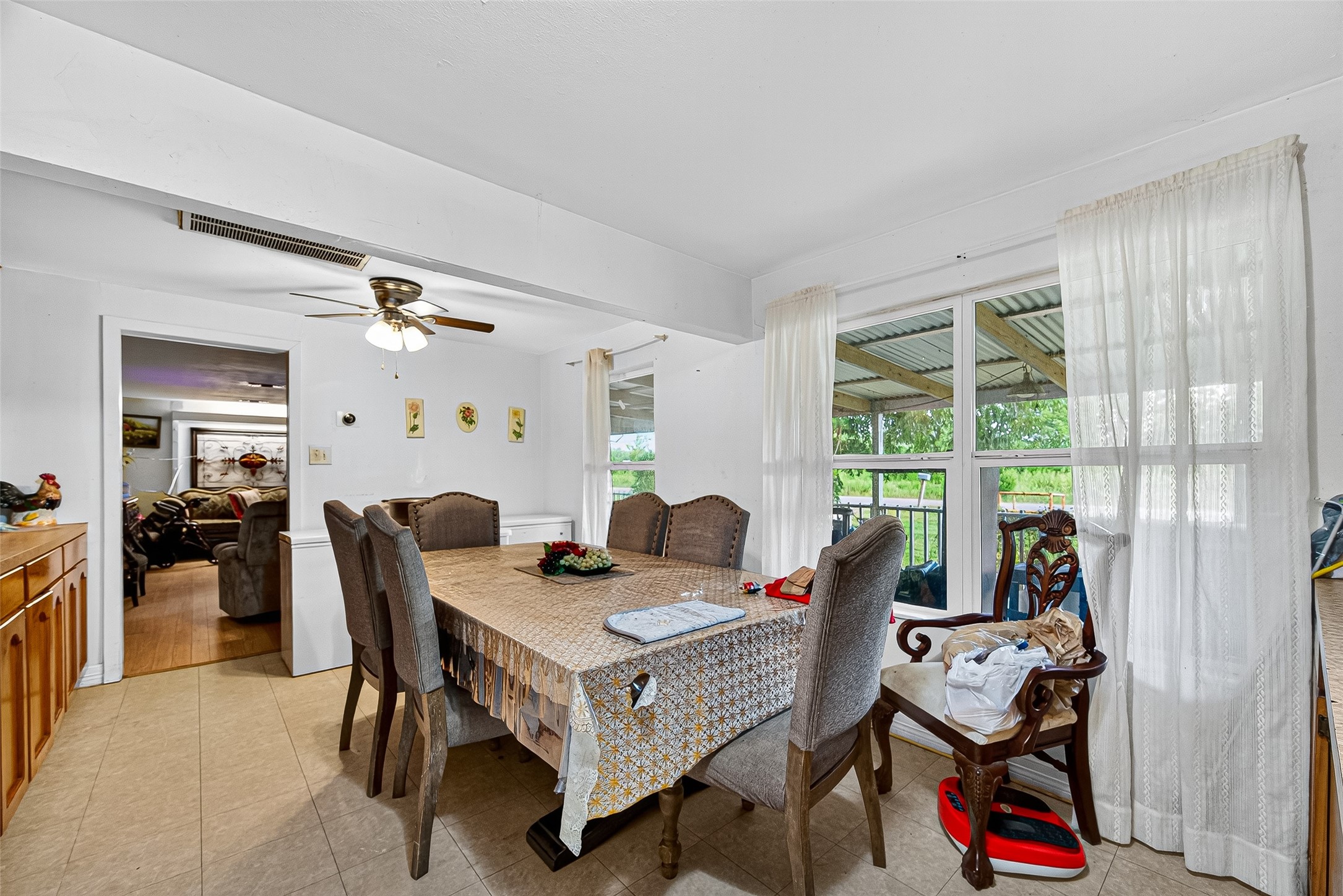1013 Battlebell Road Highlands, TX 77562 - Photo 38 of 47 a view of a workspace with furniture and a window