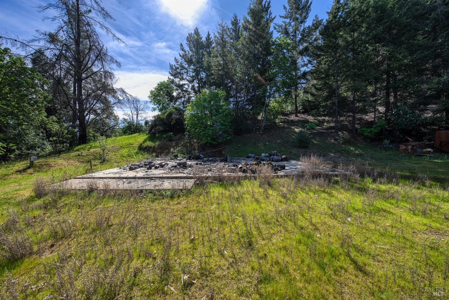 12300 Skaggs Springs Road Geyserville, CA 95441 - Photo 38 of 68 Concrete slab of Bunkhouse which burnt down from fire some years ago. Usable to rebuild in my opinion.