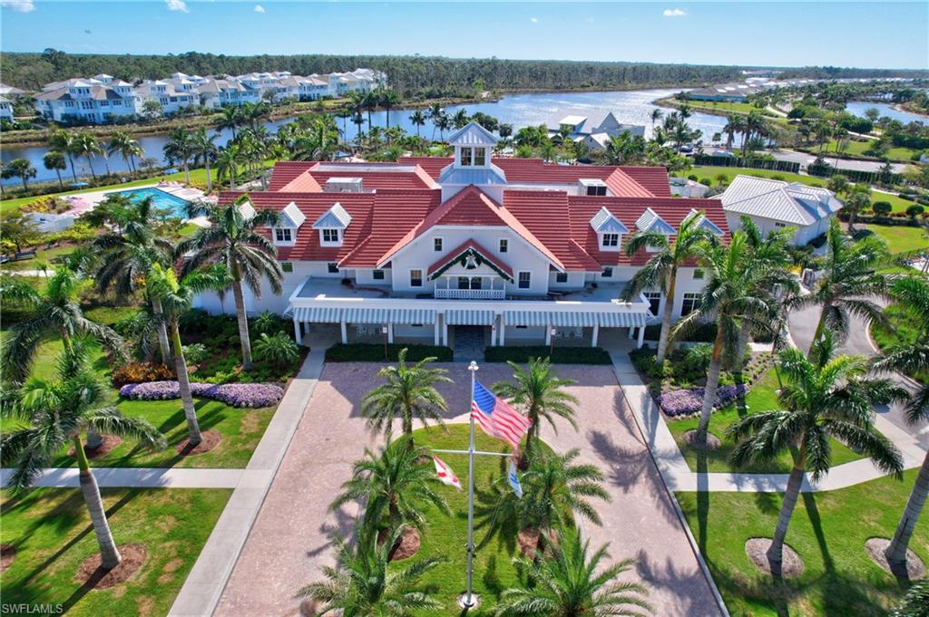 5708 Highbourne Drive Naples, FL 34113 - Photo 23 of 28 a view of a city with tall buildings