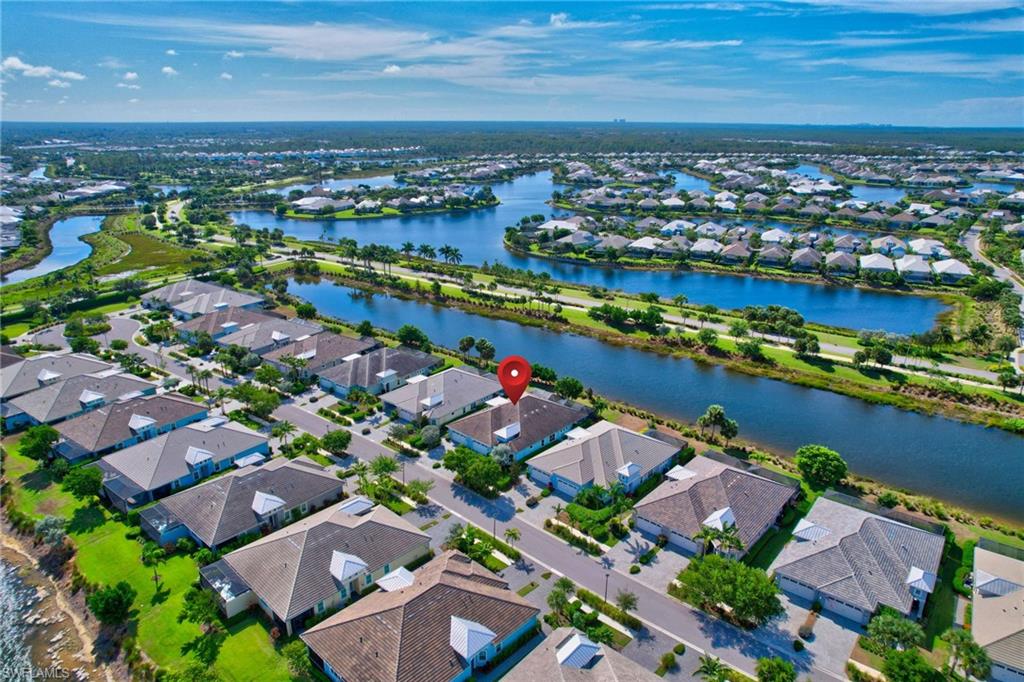 5708 Highbourne Drive Naples, FL 34113 - Photo 28 of 28 an aerial view of a city with houses