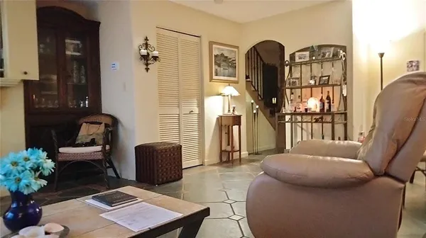 a view of a livingroom with furniture and windows