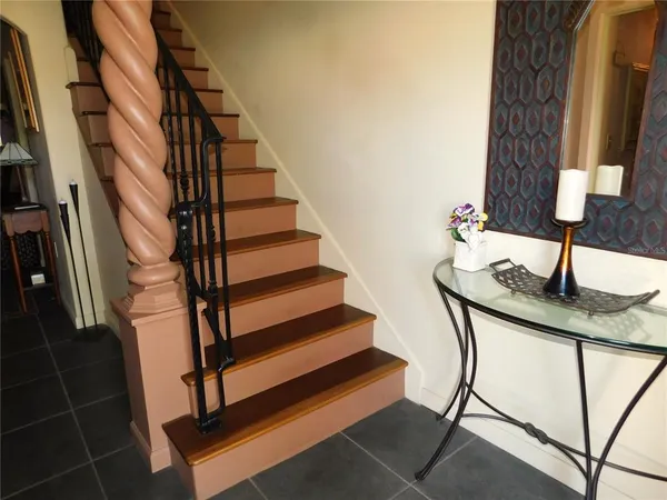 a view of entryway with a front door