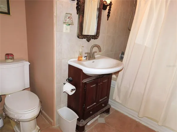 a garden view with a fountain