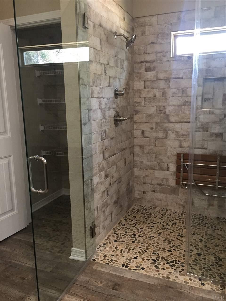 5 Springhill Road, Unit PARCEL 5 Milton, FL 32570 - Photo 24 of 47 CUSTOM TILE SHOWER WITH COBBLESTONE FLOOR